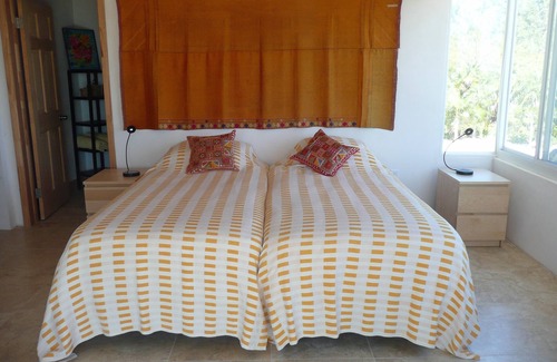 Winding Bay Villa | A luxury beachfront villa, surrounded by palms, with superb views of Winding Bay