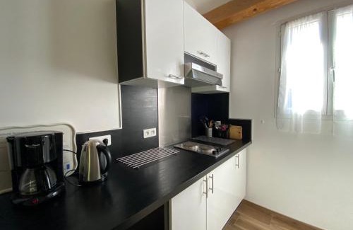 Corte House | A MANDRIA, appartements avec cuisine 30m2, patio, vue Montagnes et citadelle, 5 minutes à pied du centre ville et des rivières