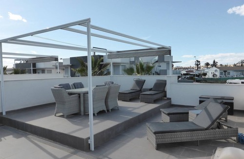Quesada Villa | "A modern villa with a large solarium" with Lake View, Pool, Terrace & Garden