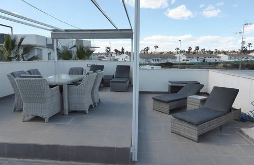 Quesada Villa | "A modern villa with a large solarium" with Lake View, Pool, Terrace & Garden