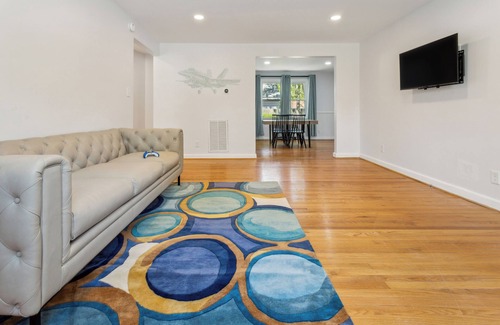 Norfolk Apartment | A Naval Aviator inspired residence adorned with contemporary fixtures. n