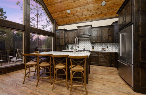 Broken Bow Cabin | A one-of-a-kind architectural masterpiece with massive window wall with view!