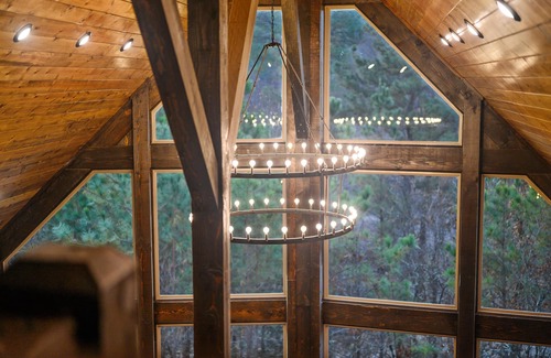 Broken Bow Cabin | A one-of-a-kind architectural masterpiece with massive window wall with view!