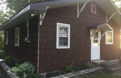 Pentwater Cottage | A peaceful little lakefront house on the sunset side of Bass Lake!