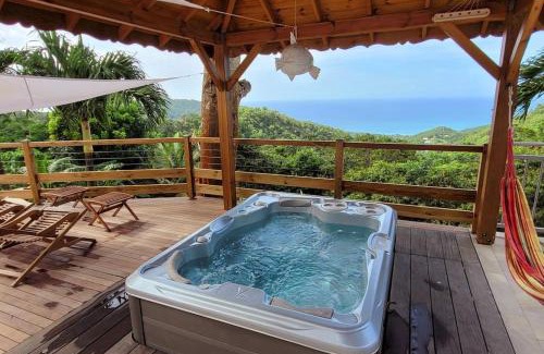 Cafeiere Apartment | A Perle de vue - Appartement de charme Piscine & spa avec vues mer & forêt