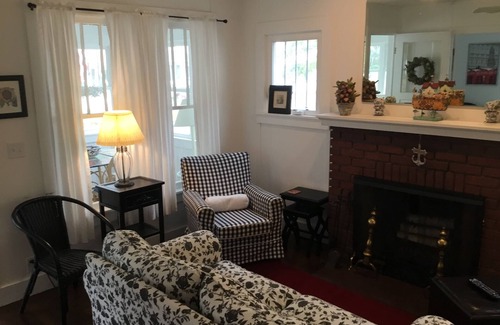 Lakeside Cottage | A picture perfect restored original cottage located inside the gates of Lakeside
