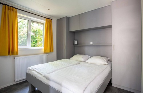 Rhenen House | A pleasant atmosphere, cozy furnishings and an open gazebo with lounge set! Nice that Forest Lodge!