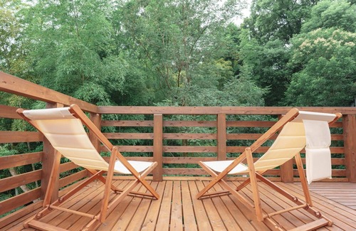 Yawatano House | A rental villa with a large garden that doubles as a dog run surrounded by trees/Ito Shizuoka