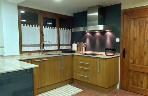 Osseja Apartment | A stone cocoon just 10 minutes from the hot springs and hiking trails.