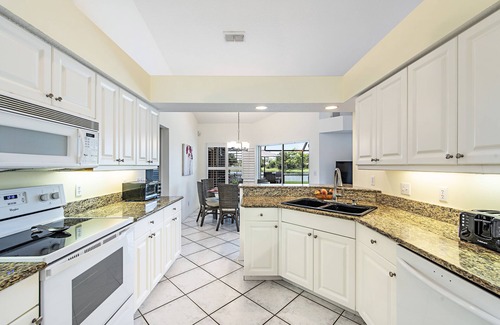 Central Naples Villa | A Stunning Lake View with Sunny Pool/Fabulous Sunsets/Modern Interior