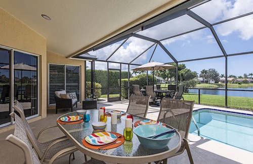 Central Naples Villa | A Stunning Lake View with Sunny Pool/Fabulous Sunsets/Modern Interior