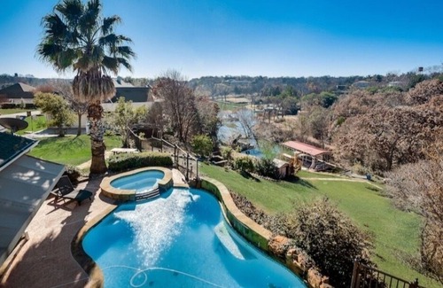 Fort Worth House | A summer boat dock & a pool