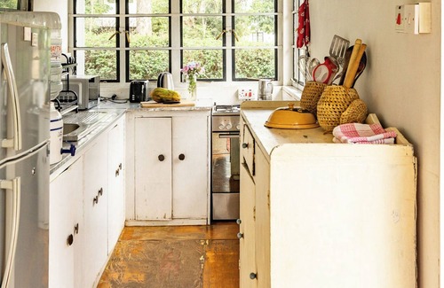 Naivasha House | A unique, eco-friendly hideaway with walls that open to the savannah, allowing safari wildlife viewing from the comfort of the living room.