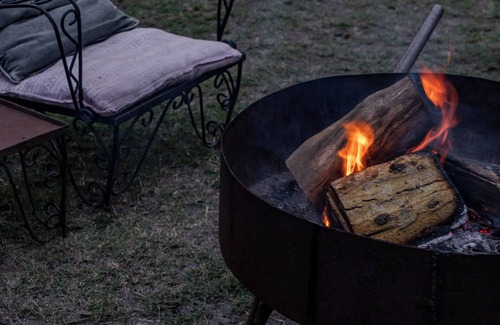 Naivasha House | A unique, eco-friendly hideaway with walls that open to the savannah, allowing safari wildlife viewing from the comfort of the living room.
