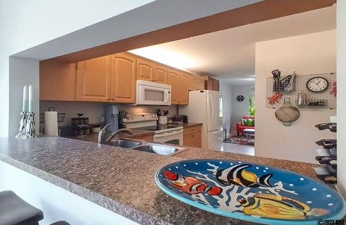 Imperial Golf Estates Condo | ABBEY ON THE LAKE 2B/2B WONDERFUL WATERFRONT NAPLES CONDO!