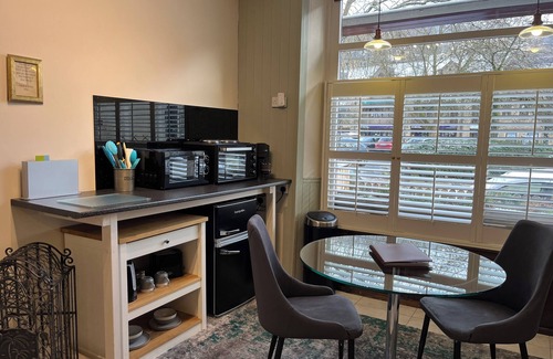 Wadsworth Apartment | Accessible Quiet Studio in Prime Central Location with Log Burner &Private Patio