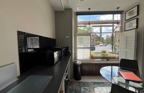 Wadsworth Apartment | Accessible Quiet Studio in Prime Central Location with Log Burner &Private Patio