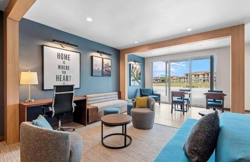 Brownsville Hotel | Accommodates 3 Suites | King Bed + Kitchen & Sofa