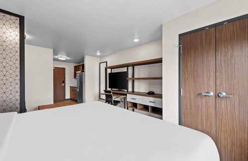 Brownsville Hotel | Accommodates 3 Suites | King Bed + Kitchen & Sofa