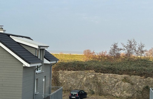 Schillig Apartment | "Achtern Diek" - Holiday apartment with sea view and private sauna by the North Sea