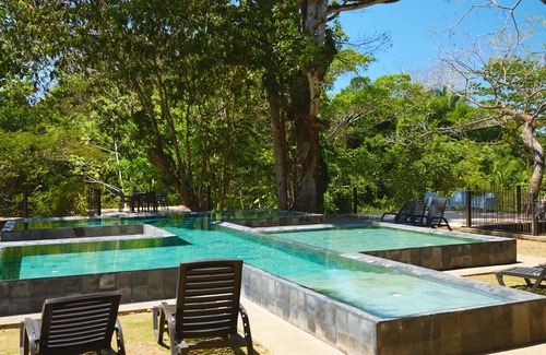 Jaco Condo | Acogedor apartamento de playa con vista al lago y