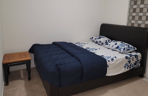 Brampton House | Adig comfortable Bedroom in Brampton .