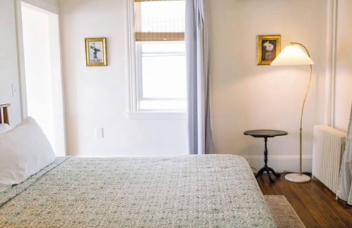 Boothbay Harbor Hotel | Admiral's Quarters Room 13 - PREMIER Ocean View 2 Room King Suite w/Living Room, Fireplace, Patio