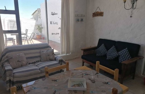 Arniston Cottage | Adorable 2 bedroom apartment with enclosed courtyard and partial sea view