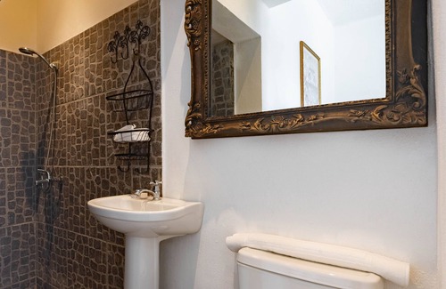 Cabrera Hotel | Adorable room with a pool, fire pit, gardens, and more- close to the beach!