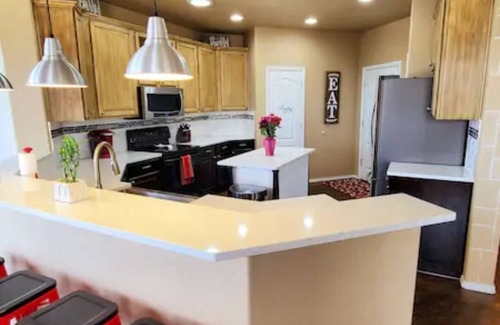 Briargate House | AF Academy Rancher - with walkout and fenced in play area for kids.
