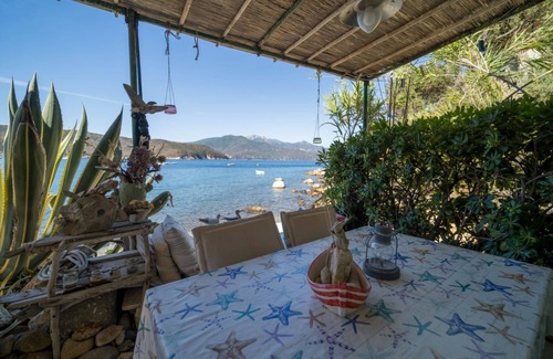 Scaglieri Apartment | Agave directly on the Forno beach with private parking space and large terrace by the sea