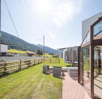 Davos Apartment | Agrimonia - 5,5-Zi Duplex Wohnung bis 9 Personen mit eigenem Garten