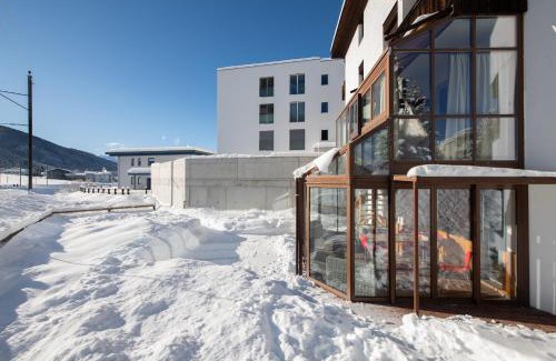 Davos Apartment | Agrimonia - 5,5-Zi Duplex Wohnung bis 9 Personen mit eigenem Garten