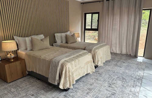 Hoedspruit Villa | Air conditioned large 3 bedroom Villa with private pool.