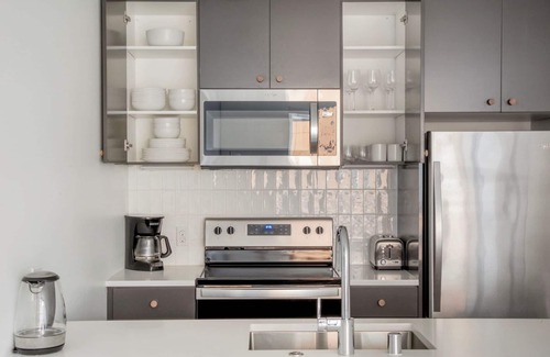 Judkins Park Apartment | Airy Central District 1BR w/Gym & Pets, nr Dining, by Blueground