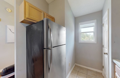 Surfside Beach Condo | Airy condo in a great location with balcony, W/D, and pool access - dog-friendly