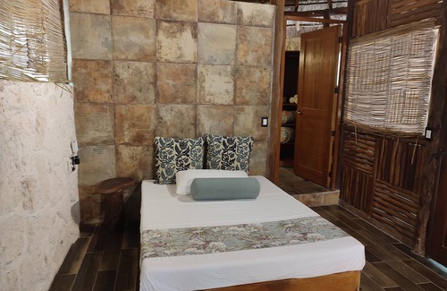 Puerto Morelos Hotel | Aldea Maya-Ha Cabañas con cenotes