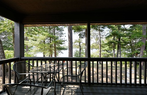 Webb Lake Condo | All 4 lakefront condos! Private beach, dock, sauna, club room, decks.