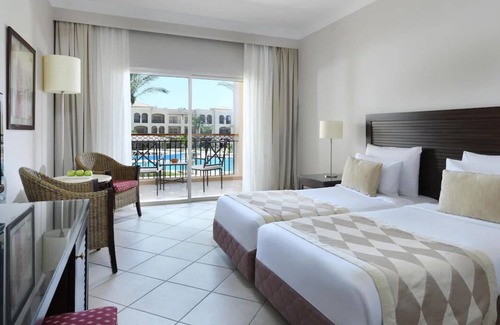 Sharm El Sheikh Hotel | All‑Inclusive & Waterslides Resort w/Beach Access, Tennis, Games & Kids’ Club