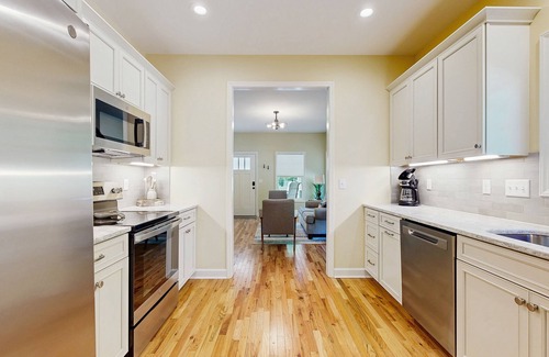 West Side Historic District Cottage | All-new cottage with deck, grill, & washer/dryer - near downtown & Rail Trail