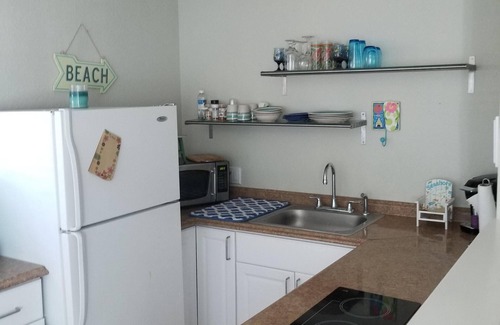 Belleair Bluffs Apartment | All Pets Free! Steps to Striking Heated Pool & Spa withlPrivate Patio