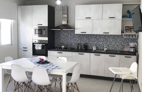 Reitani House | Almaga to experience the crystalline sea of Sicily as if you were at home.