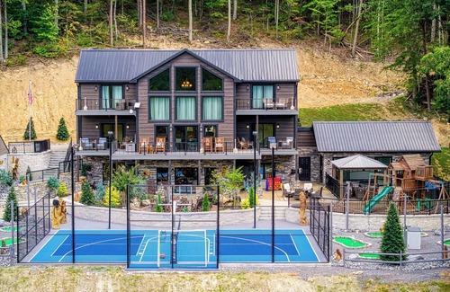 Gatlinburg - Pigeon Forge Cabin | Alpine Splash, Private indoor pool, theater/gaming, Pond, Basketball court!