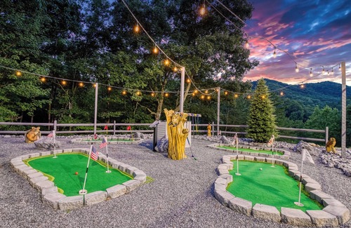 Gatlinburg - Pigeon Forge Cabin | Alpine Splash, Private indoor pool, theater/gaming, Pond, Basketball court!
