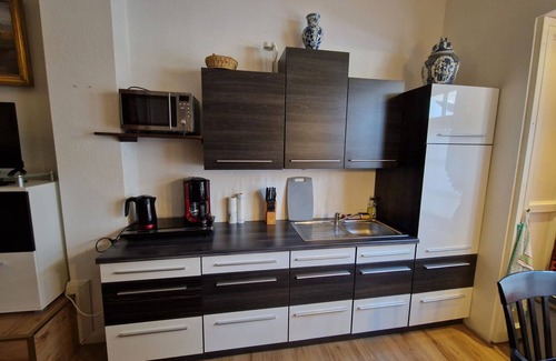 Bad Segeberg Apartment | Am Rathaus/Sondermann, vacation apartment - apartment B left/bedroom/living/kitchen combination