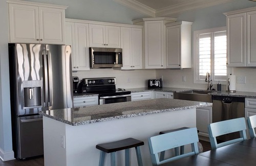Holden Beach House | Amazing beach retreat great for family fun and relaxing at the bar by the pool