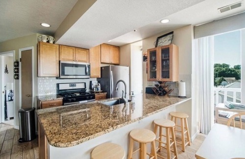 Boyne City Condo | AMAZING LOCATION! Condo in Heart of Downtown-Walk to Restaurants, Shops & Beach