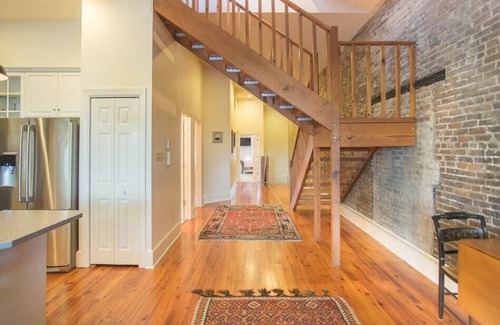Historic District - North Condo | Amazing Loft with Parking and Deck above River Street by Lucky Savannah