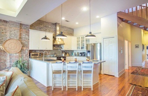 Historic District - North Condo | Amazing Loft with Parking and Deck above River Street by Lucky Savannah