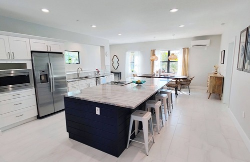 Indian Rocks Beach House | Amazing Oceanview Beach Mansion Private Warm Pool Sunset Rooftop, Trail to Beach